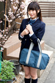 Nonomiya misato standing in street holding bag