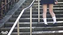 Kogal walking up steps