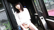 Machiko in corridor bottomless lifting top up over her shaved pussy masturbating with banana