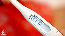Reading temperature on thermometer