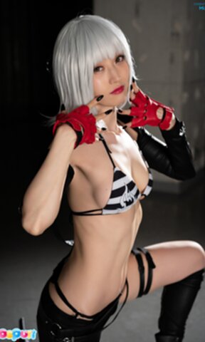 Mizuki lowers shorts and panties and shows off her nice round ass