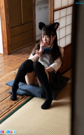 Ria Kurumi in knee high stockings rubbing her pussy