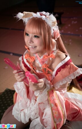 Misa on her knees licking and sucking dildo