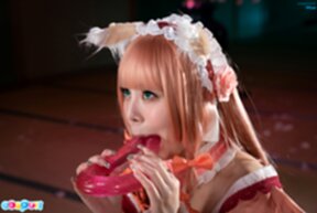 Misa on her knees licking and sucking dildo