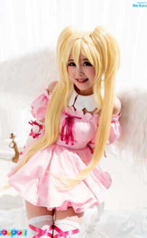 Ria Kurumi raising pink dress to show her shaved pussy and pert ass