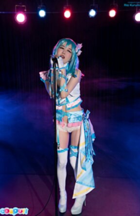 Ria Kurumi singing at microphone lowering panties