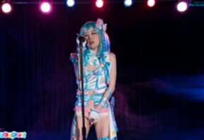 Ria Kurumi singing at microphone lowering panties