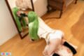 On all fours in front of mirror sucking dildo