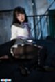 Ria kurumi seated wearing black pantyhose