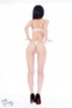 Win bra and panties wearing high heels