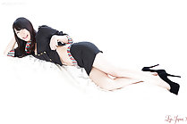 Aki Tojo raising top over her waist wearing short skirt in high heels