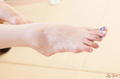 Bare foot painted toenails