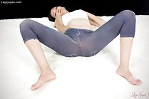 Yukishiro Madoka spreading her legs in leggings