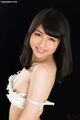 Saionji reo with bra lowered exposing her breasts