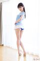 Yurikawa sara with hands on hips looking back short skirt riding up exposing panties high heels