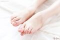 Matsuda anna stretching out her bare feet