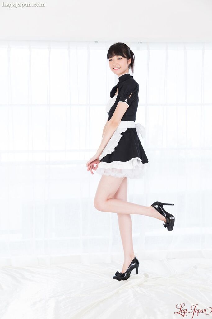 Maid in uniform wearing high heels