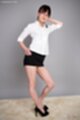 Hand on hip in high heels