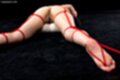 Mizuki tied up with shibari rope ass raised pussy exposed