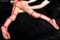Lying on her front tied up naked bare feet