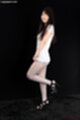 Pulling tshirt down wearing high heels