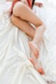 Kamimoto rio lying on her side bare ass knees drawn up bare feet