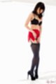 Yamazaki honoka in short skirt black stockings high heels looking down