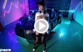 Cutie Ria Kurumi lowers panties and masturbates shaved pussy beside sports car